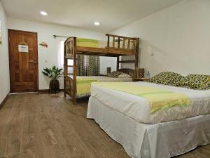 Ένα ή περισσότερα κρεβάτια σε δωμάτιο στο San Simian Lodge +87 φωτογραφίες