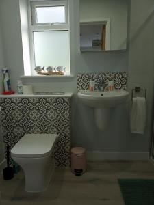 Koupelna v ubytování Hygga + 10 fotografií