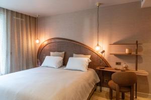 Postel nebo postele na pokoji v ubytování Yndo Hôtel
