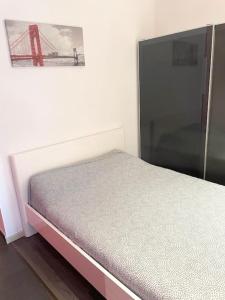 Ένα ή περισσότερα κρεβάτια σε δωμάτιο στο Appartement in Brussels Centre