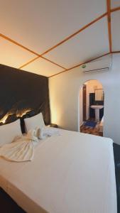 Postel nebo postele na pokoji v ubytování Hotel Samanala Sigiriya