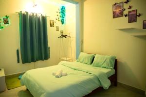 Rúm í herbergi á Bảo Dung Hotel