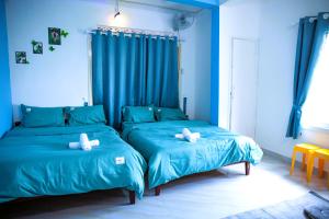 Rúm í herbergi á Bảo Dung Hotel