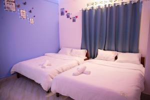 Rúm í herbergi á Bảo Dung Hotel