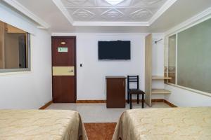 TV in/ali zabaviščno središče v nastanitvi Hotel Zulita