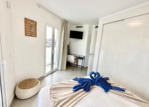 Postel nebo postele na pokoji v ubytování Caramel Cookie con Piscina, Doble terraza, Parking y WIFI