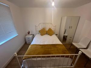 Een bed of bedden in een kamer bij The O2 Arena ExCel Canary Wharf London