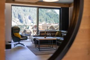Posezení v ubytování Atemberaubendes und charismatisches Luxus-Apartment in der Residenz Silvretta - Inklusive Silvretta Card Premium