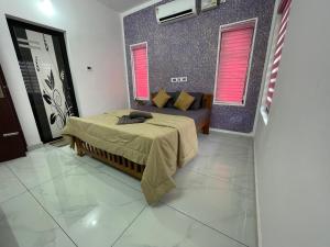 Postel nebo postele na pokoji v ubytování Varkala Life Homestay