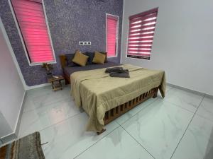 Postel nebo postele na pokoji v ubytování Varkala Life Homestay