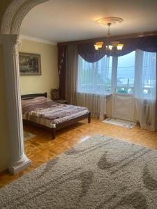 Posteľ alebo postele v izbe v ubytovaní Guest House Arnika