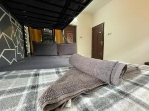 Postel nebo postele na pokoji v ubytování Varkala Life Homestay