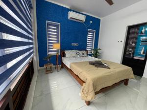 Postel nebo postele na pokoji v ubytování Varkala Life Homestay