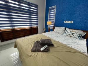 Postel nebo postele na pokoji v ubytování Varkala Life Homestay