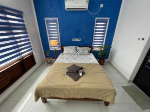 Postel nebo postele na pokoji v ubytování Varkala Life Homestay