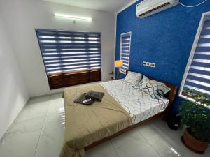Postel nebo postele na pokoji v ubytování Varkala Life Homestay