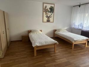 Postel nebo postele na pokoji v ubytování House Lucky
