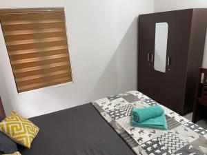 Postel nebo postele na pokoji v ubytování Varkala Life Homestay