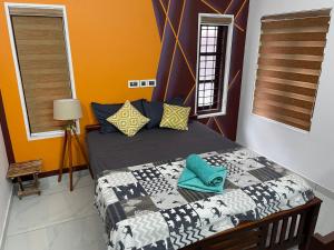Postel nebo postele na pokoji v ubytování Varkala Life Homestay