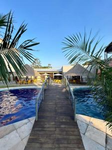 Πισίνα στο ή κοντά στο Flat 2 Suítes, piscina e churrasqueira em Alter