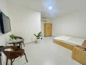 Postel nebo postele na pokoji v ubytování Maria Hotel