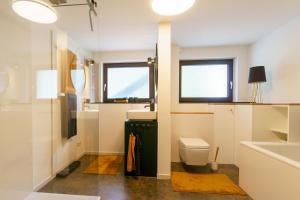 Koupelna v ubytování Stilvolle Wohnung + 8 fotografií