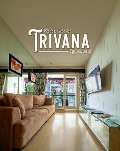 TV a/nebo společenská místnost v ubytování Trivana Pool View 3BR Senayan