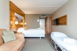 Postelja oz. postelje v sobi nastanitve Suite with stunning sea view