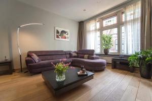 Et opholdsområde på Family Home Hendriks + 53 billeder