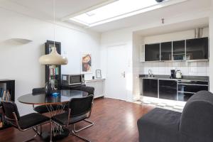Kuchyň nebo kuchyňský kout v ubytování Apartment De Drie Tulpen