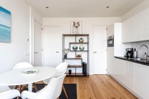 Кухня или мини-кухня в The apartment Shell 42
