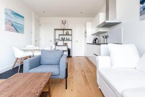 Кухня или мини-кухня в The apartment Shell 42
