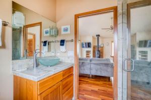 a bathroom with a sink and a shower at Tide and True - Meredith Lodging in Lincoln City +35 photos
