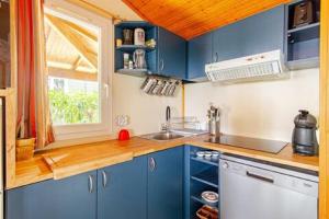Kuchyňa alebo kuchynka v ubytovaní Chalet Mer et Pins