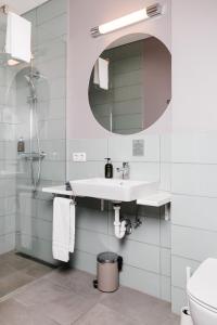 Bagno di ODDSSON Midtown Hotel