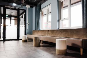 Area soggiorno di ODDSSON Midtown Hotel