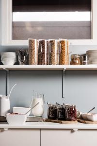 Cucina o angolo cottura di ODDSSON Midtown Hotel
