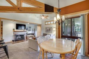 a dining room and living room with a table and chairs at Ski Shuttle and Mountain Views Keystone Resort Home in Keystone