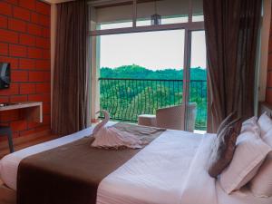 Krevet ili kreveti u jedinici u okviru objekta Serene Crest Resort