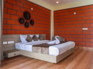Krevet ili kreveti u jedinici u okviru objekta Serene Crest Resort