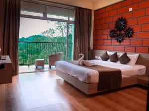 Krevet ili kreveti u jedinici u okviru objekta Serene Crest Resort