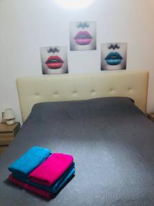 A bed or beds in a room at First Line Beach Apartment with Ocean View La Arena Még 25 kép