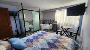 Postel nebo postele na pokoji v ubytování TRANSFER VIP HOSTEL