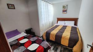 Postel nebo postele na pokoji v ubytování TRANSFER VIP HOSTEL