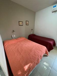Ένα ή περισσότερα κρεβάτια σε δωμάτιο στο Ámbar apart hotel
