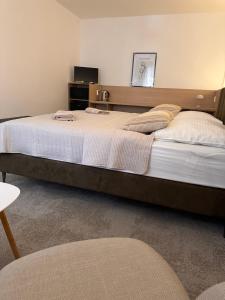 Posteľ alebo postele v izbe v ubytovaní Apartmány Reduta - new