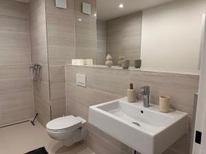 Koupelna v ubytování Apartmány Reduta - new