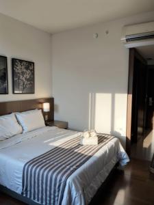 Cama ou camas em um quarto em Hotel Vivenzo Savassi Belo Horizonte