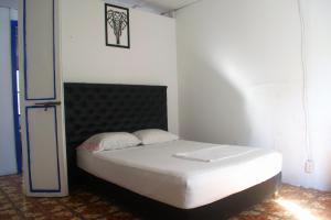 Postel nebo postele na pokoji v ubytování Hosting and Travel Services 420