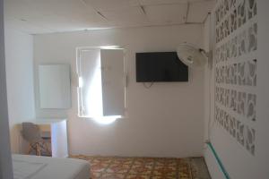 TV a/nebo společenská místnost v ubytování Hosting and Travel Services 420